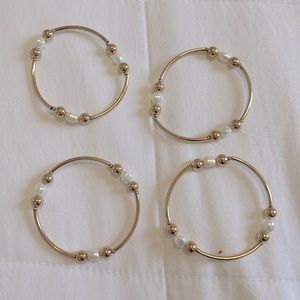 gold bracelets with pearls